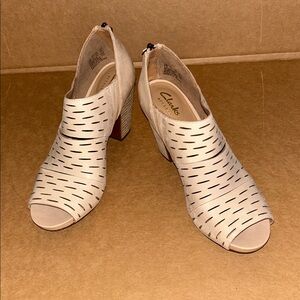 Clark’s Artisan open toe ankle shoes.